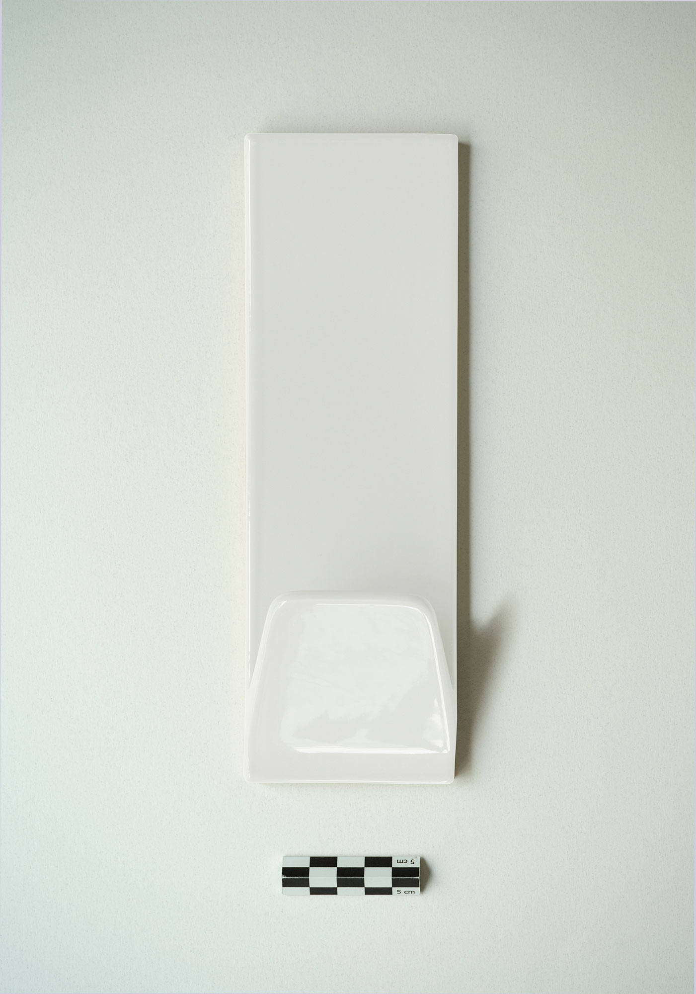 A white ceramic hook packshot